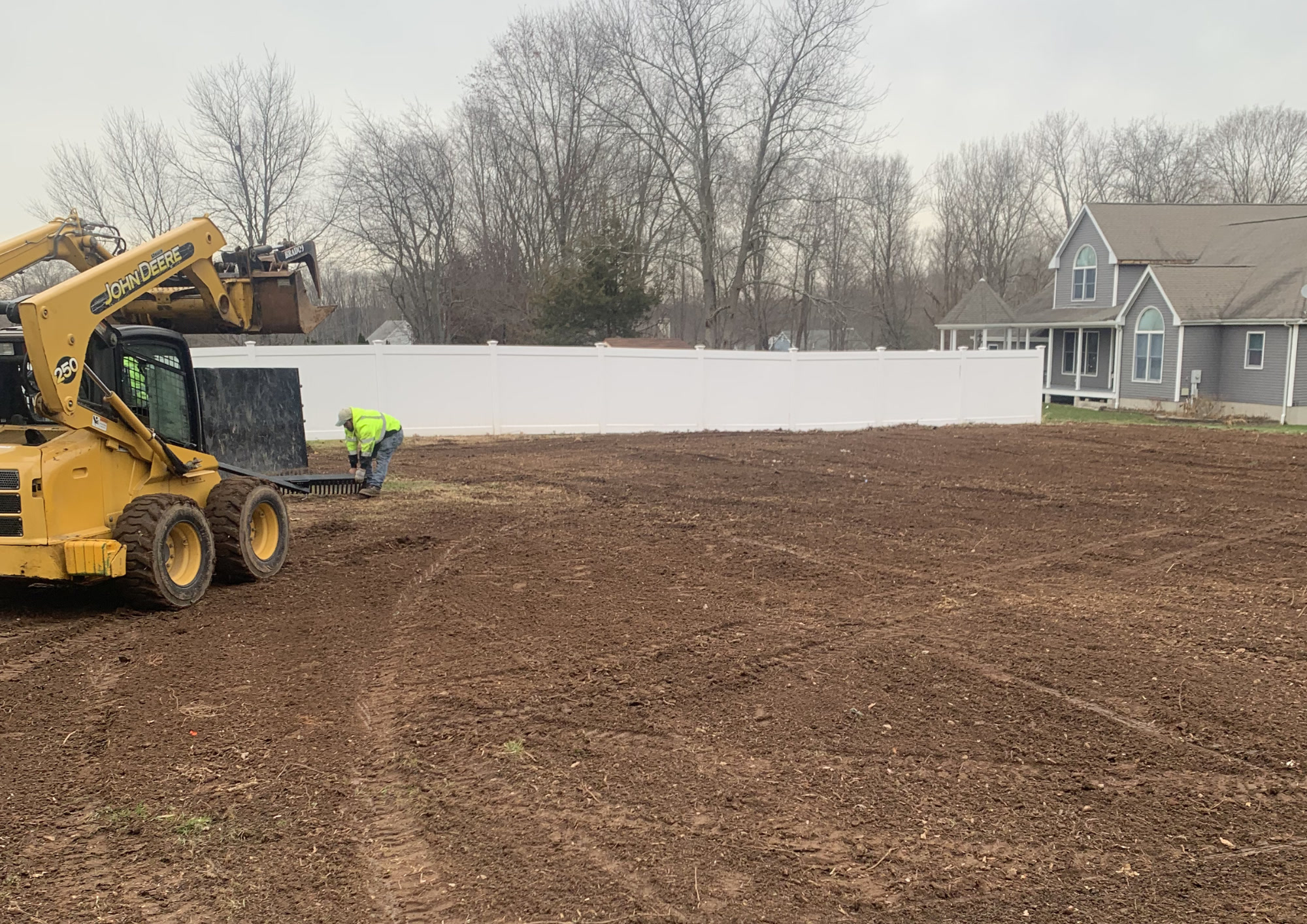 Tree Wise Guys truck in spring with cherry blossoms - topsoil and seeding service